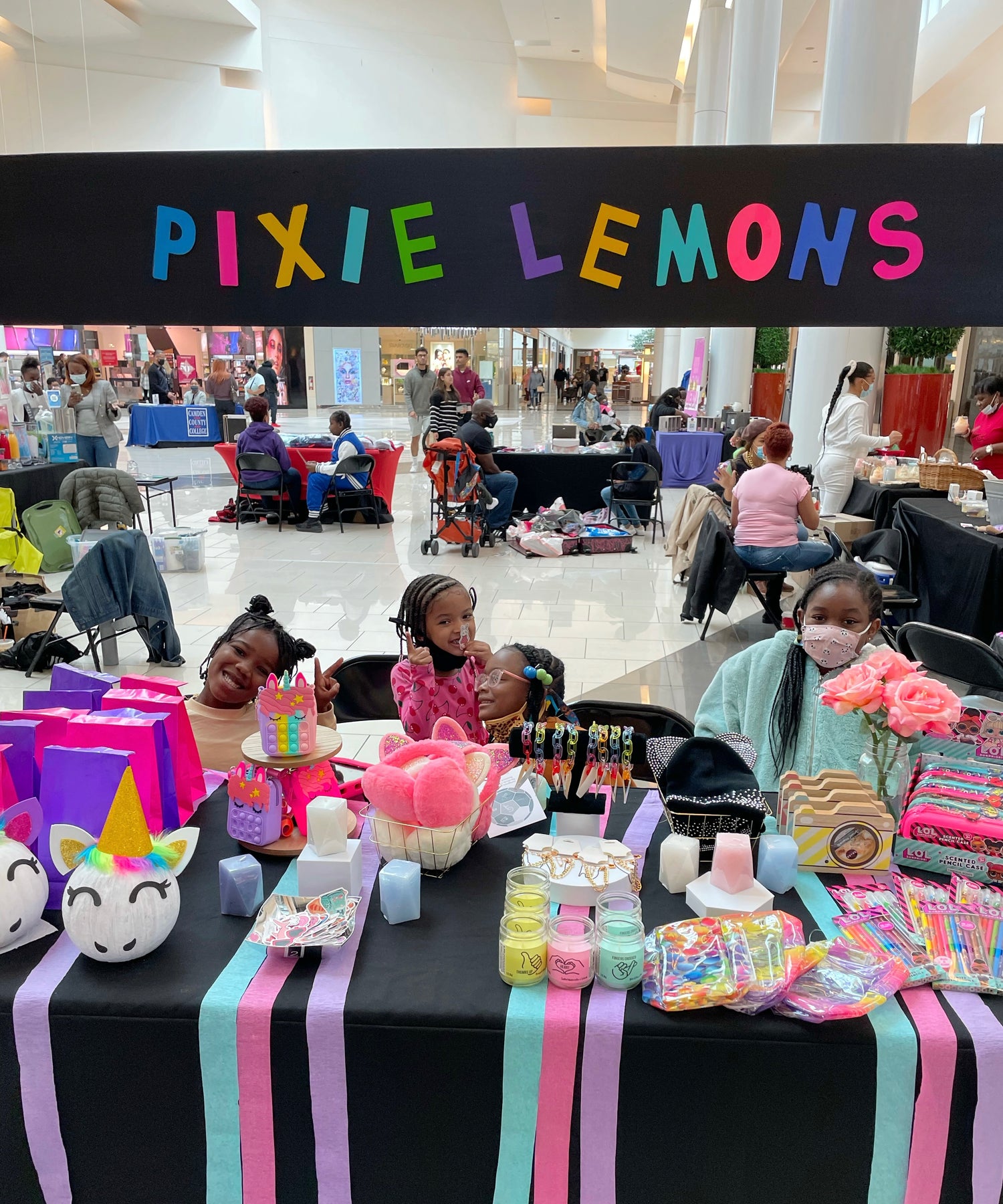 Pixie Lemons Founders smiling at a Pop up Shop